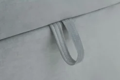 Tapczan z pojemnikiem i geometrycznym wezgłowiem NELA 100x200 cm